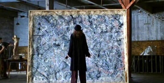 Julia Roberts, as Professor Katherine Ann Watson, standing in front of a Jackson Pollock painting, in the film  Mona Lisa Smile.